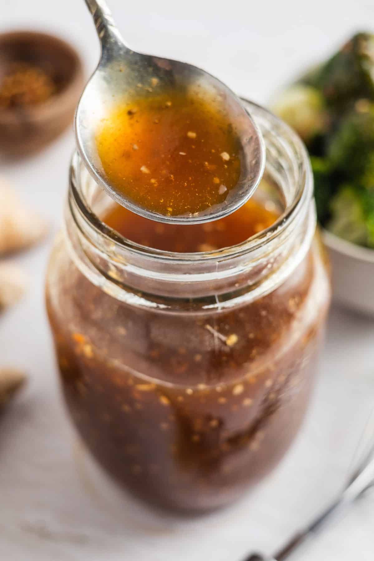 Sugar-free teriyaki sauce in a glass jar, cooled and ready for use in meals
