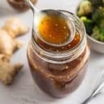 Finished sugar-free teriyaki sauce in a clear jar, ideal for marinades or dipping
