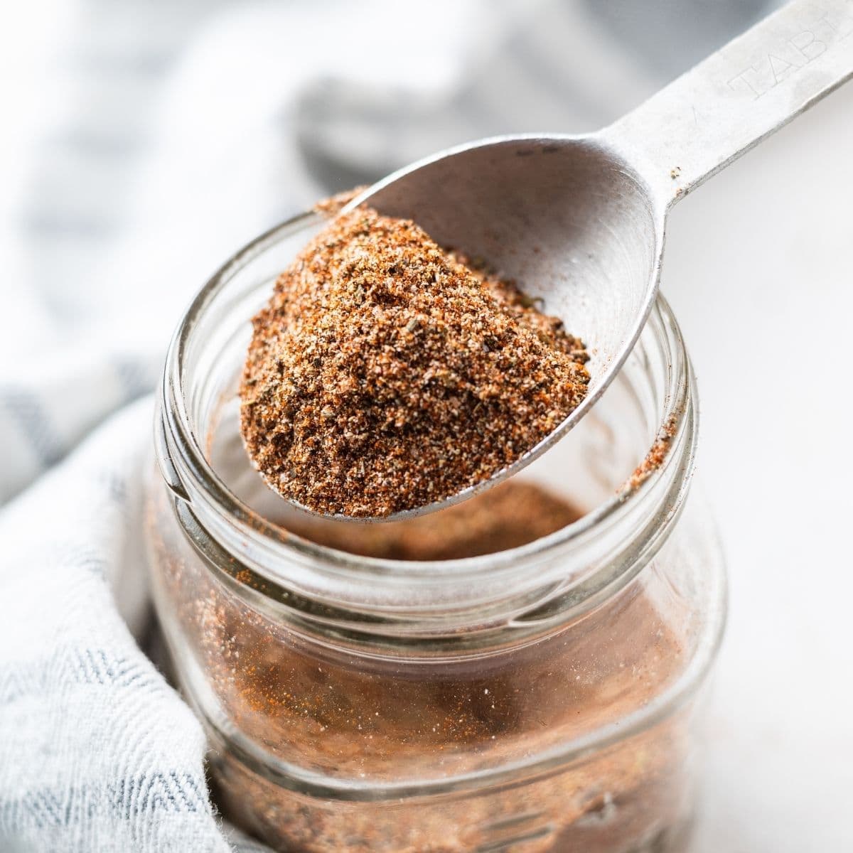DIY blackened seasoning mix prepared and stored in a jar