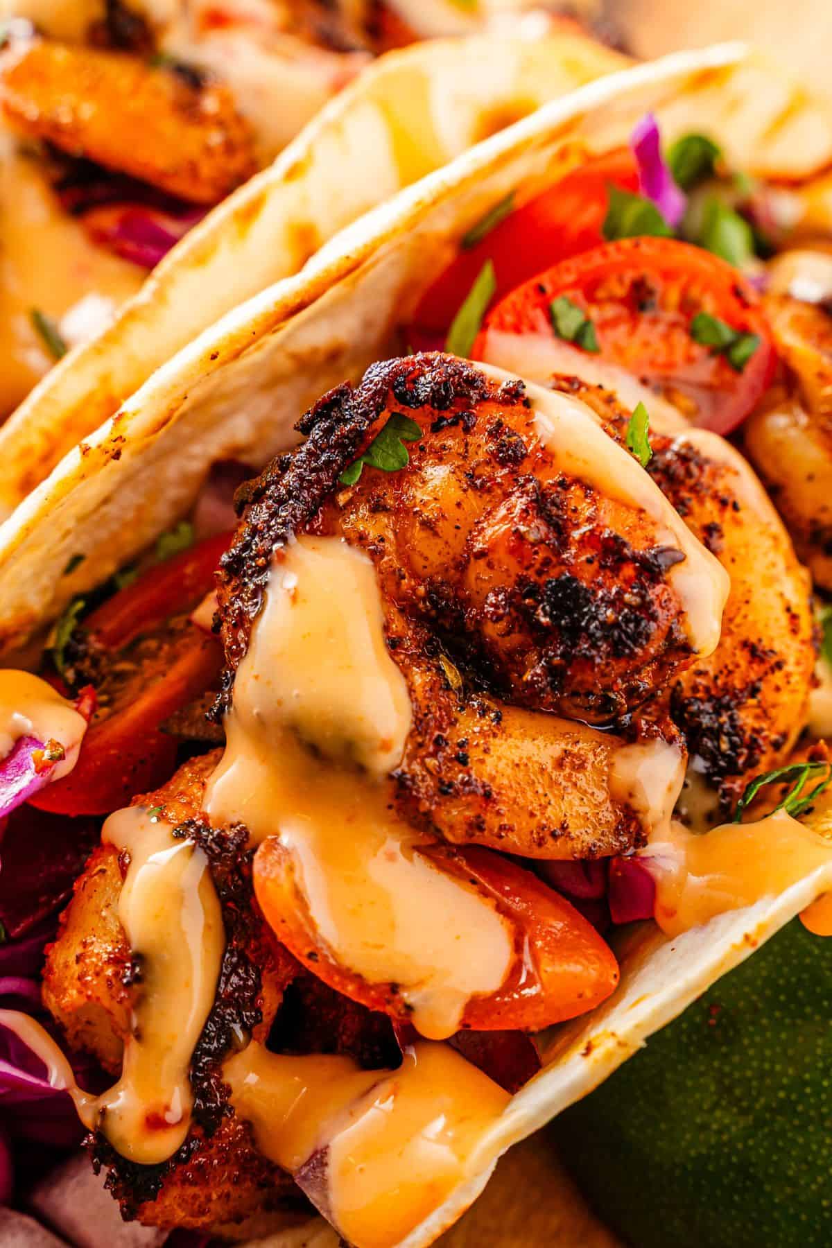 Boldly seasoned blackened shrimp tacos with fresh crunchy vegetables