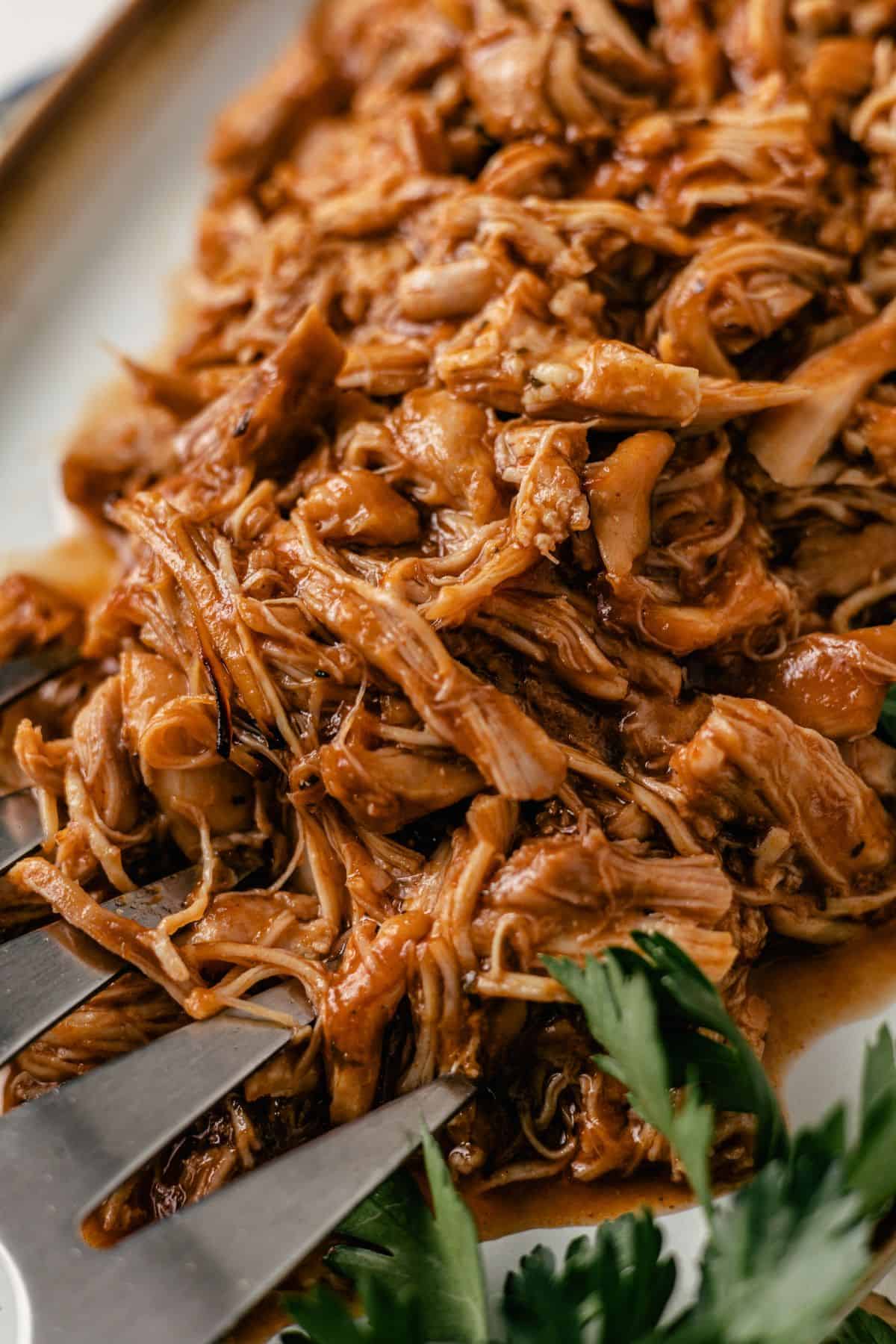 Instant Pot pulled chicken tossed in barbecue sauce