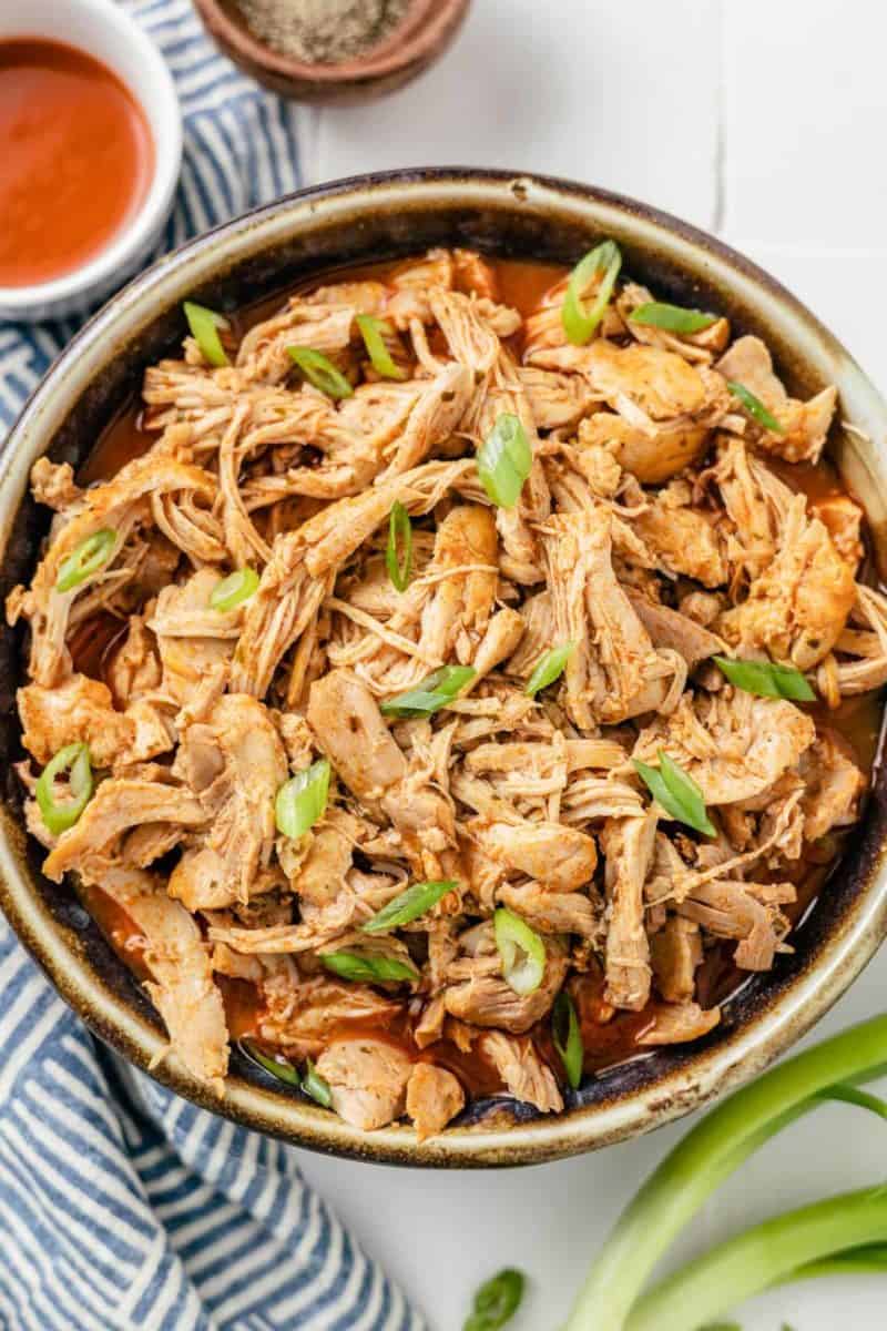 Bowl of flavorful buffalo chicken, tender, juicy, and ready to serve