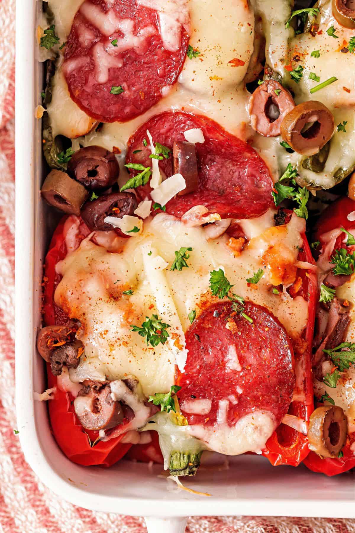 Colorful bell peppers stuffed with sausage sauce and cheese