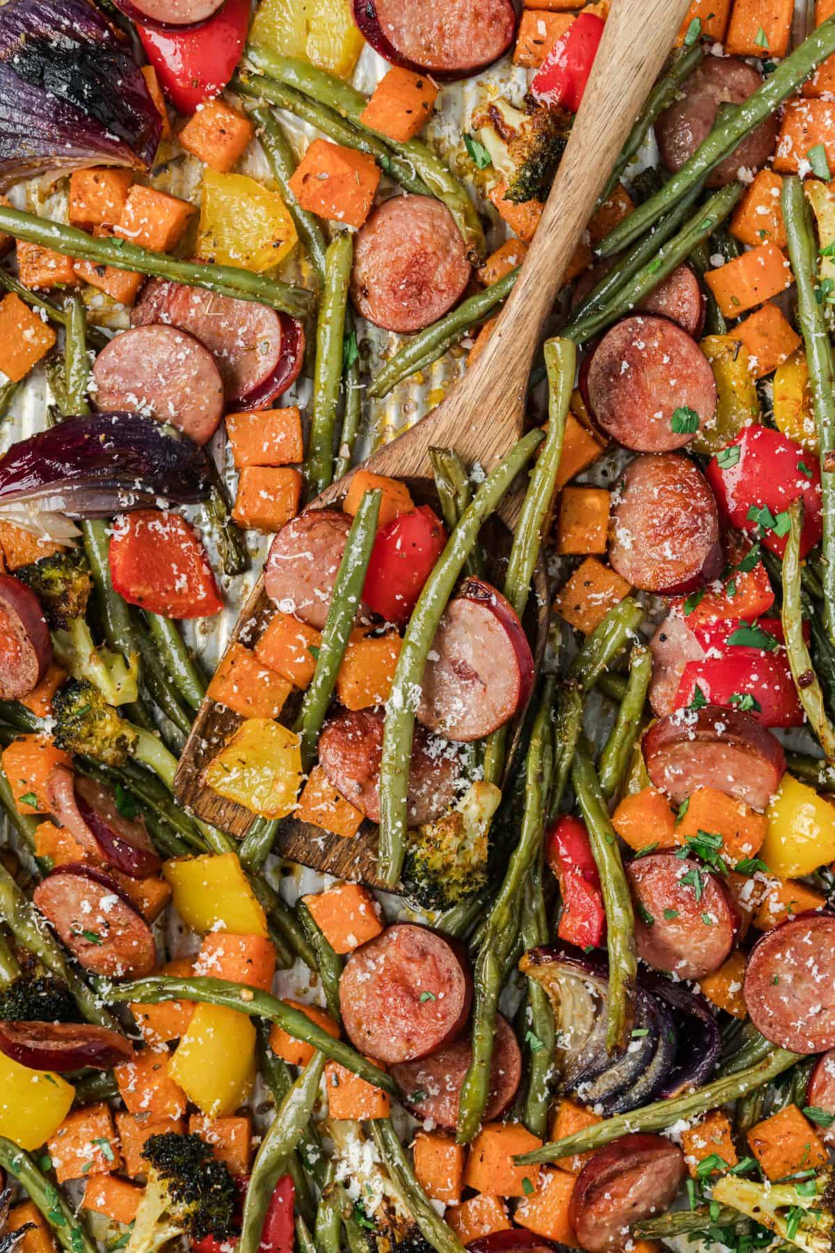 Sheet pan smoked sausage with sweet potatoes and vibrant roasted vegetables