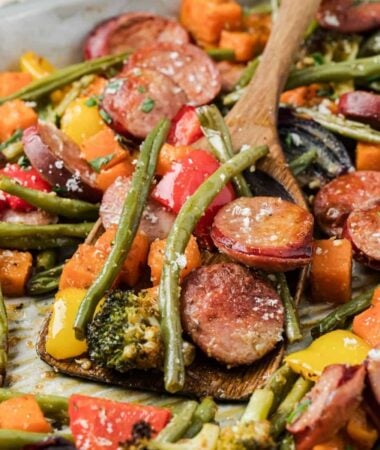 Easy oven roasted sausage and veggies meal prep style on baking tray