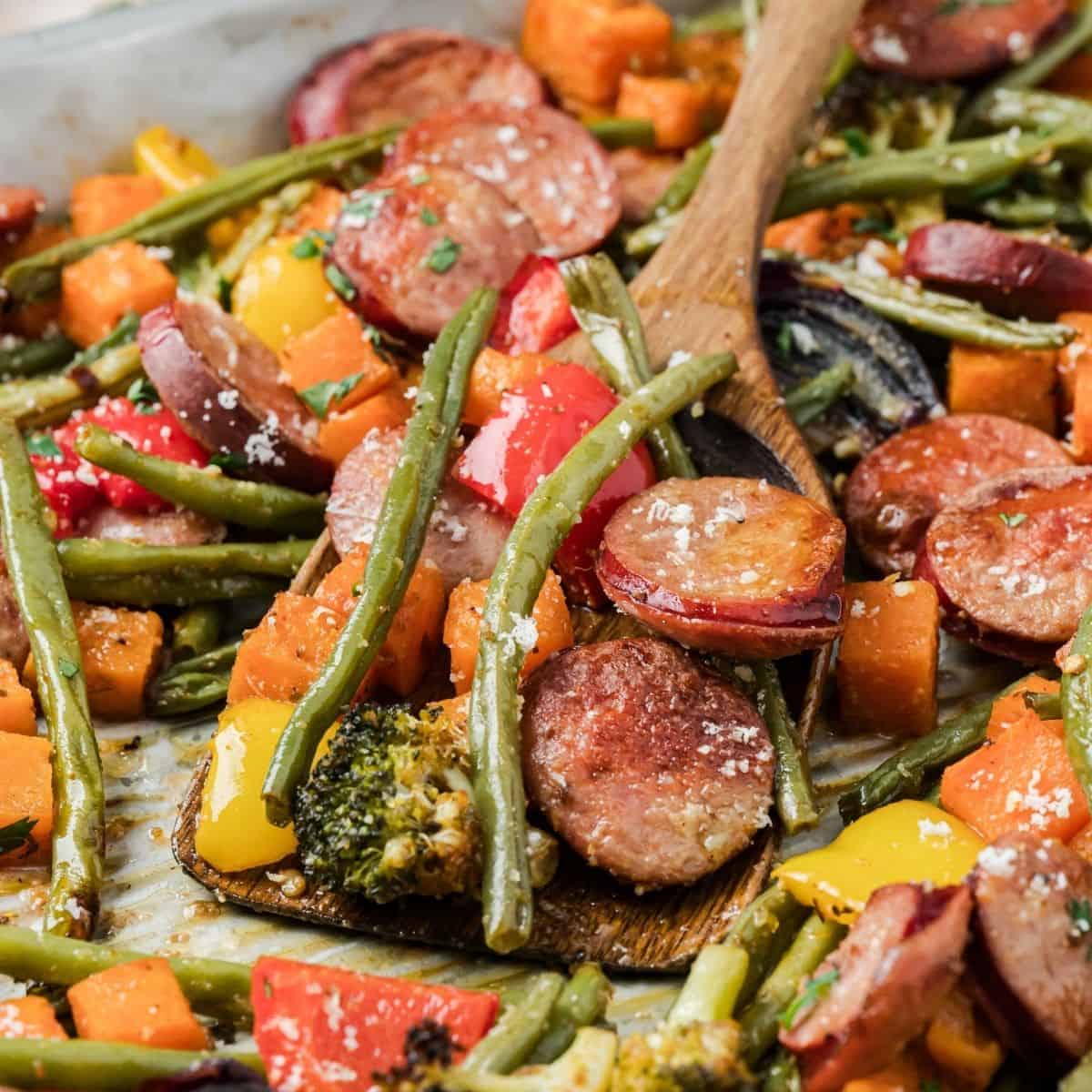 Easy oven roasted sausage and veggies meal prep style on baking tray