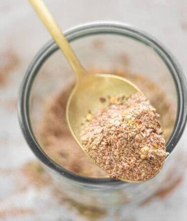 Glass jar filled with homemade fajita seasoning, ready to use for tacos, bowls, and fajitas