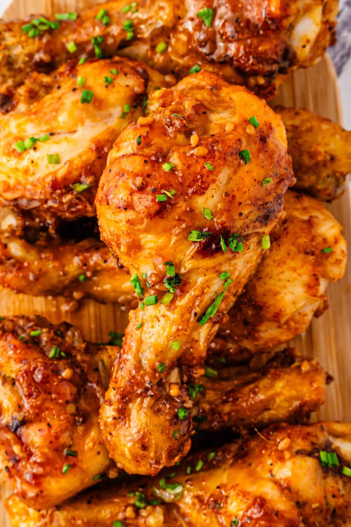 Sticky honey garlic drumsticks with glossy garlic ginger glaze