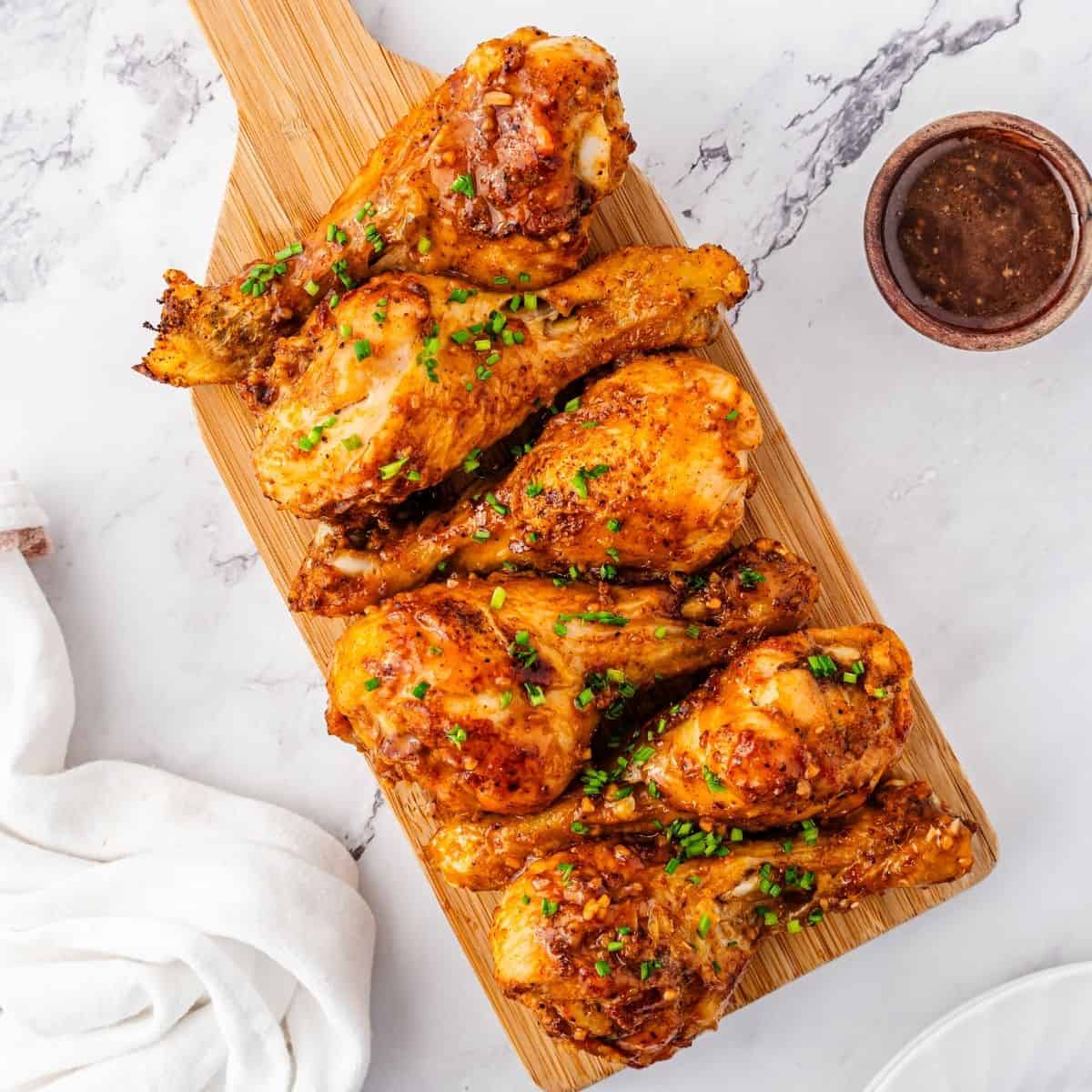 Air fried drumsticks brushed with sweet honey garlic glaze