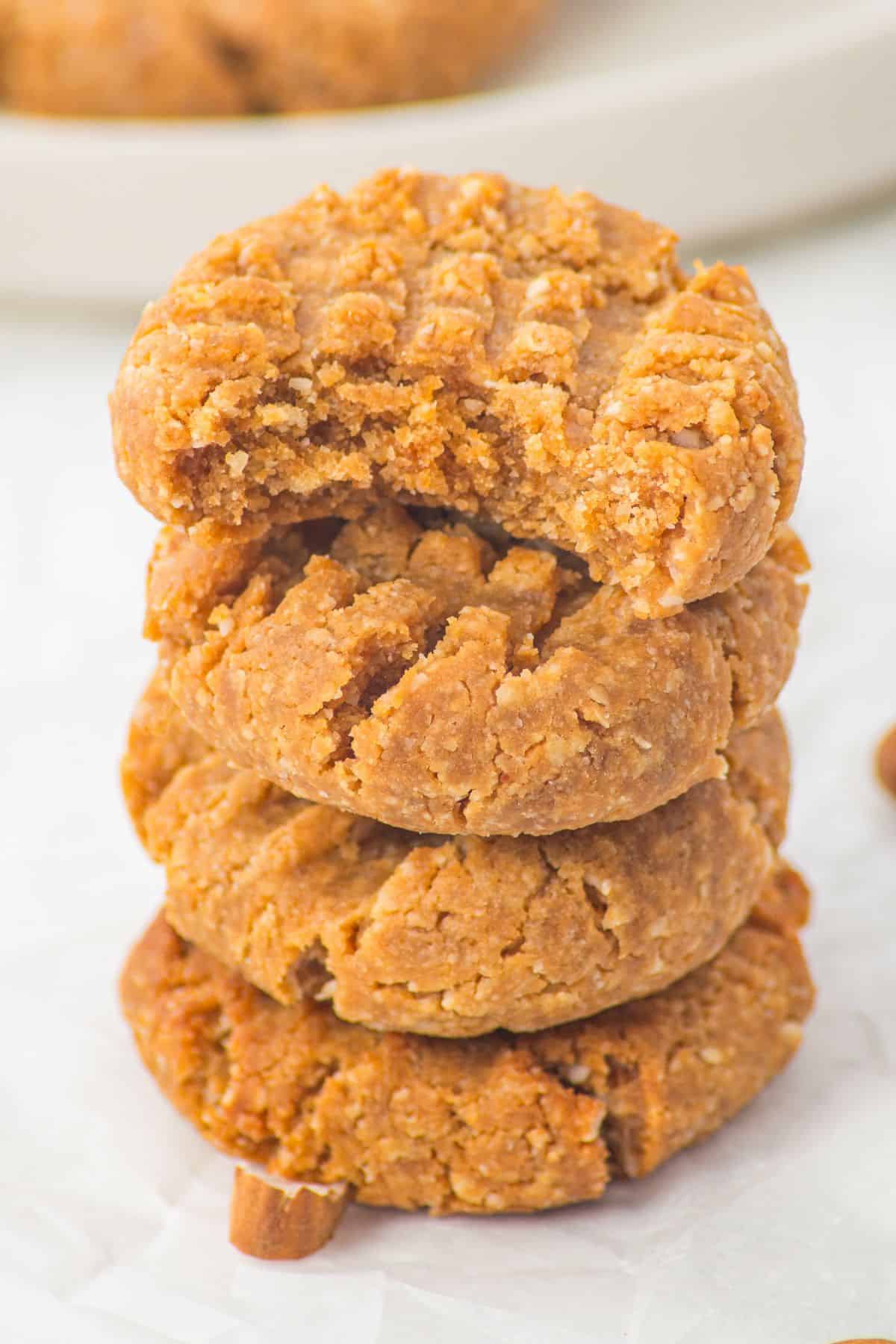 almond flour peanut butter cookies with fork marks stacked on top of each other