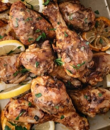 Oven-baked chicken drumsticks with crispy tips and tender, juicy meat inside