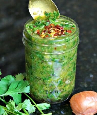 chimichurri sauce with red pepper flakes on top