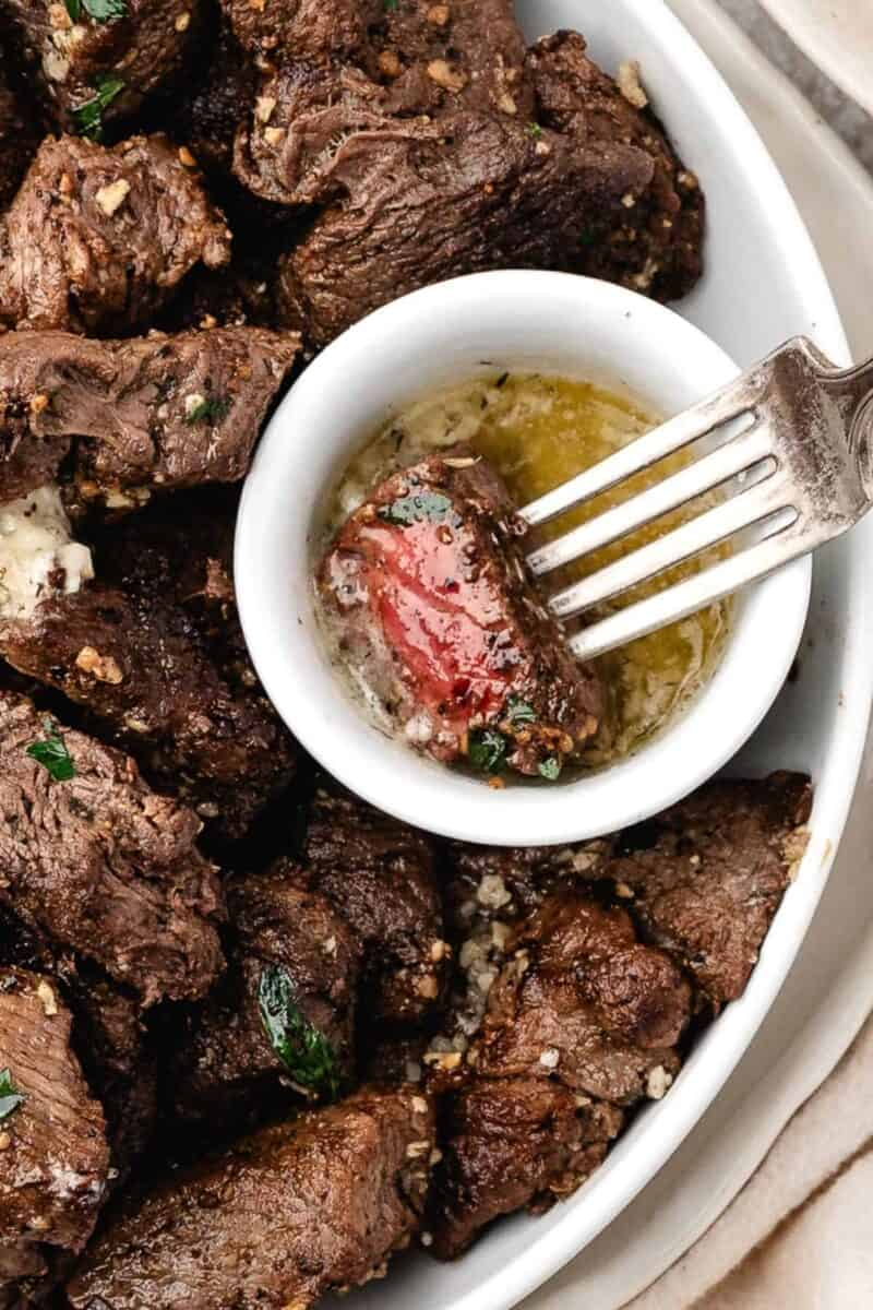 Sizzling steak bites with a glossy garlic butter coating