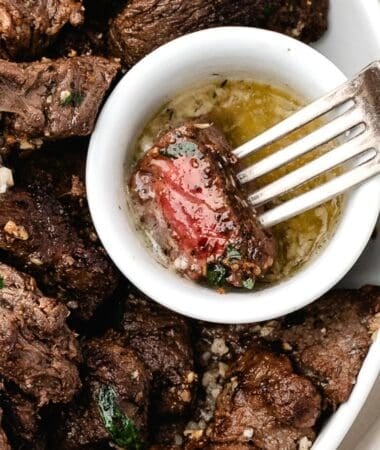 Perfectly seared steak bites coated in rich, buttery garlic sauce