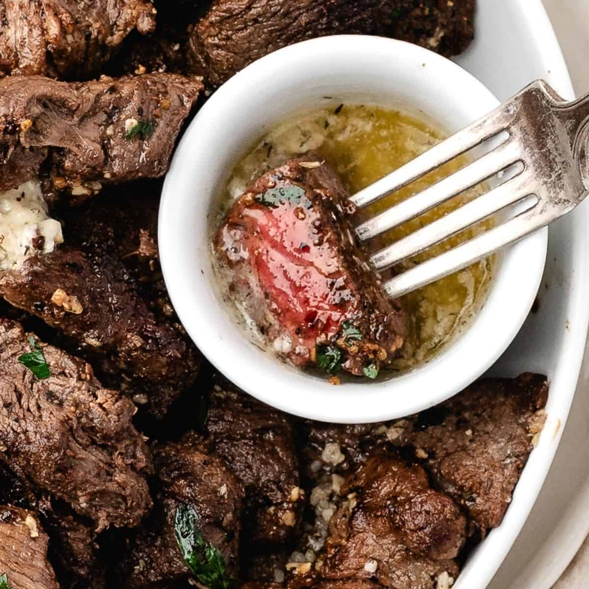 Perfectly seared steak bites coated in rich, buttery garlic sauce