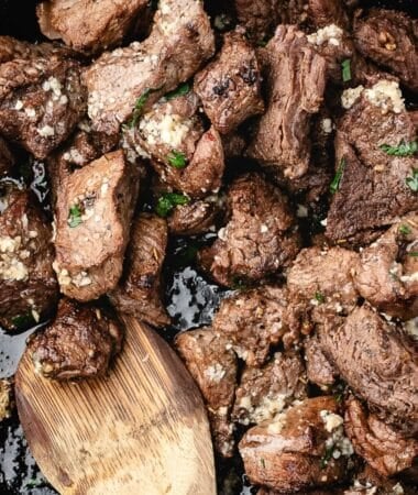 easy tender garlic butter steak bites in a skillet