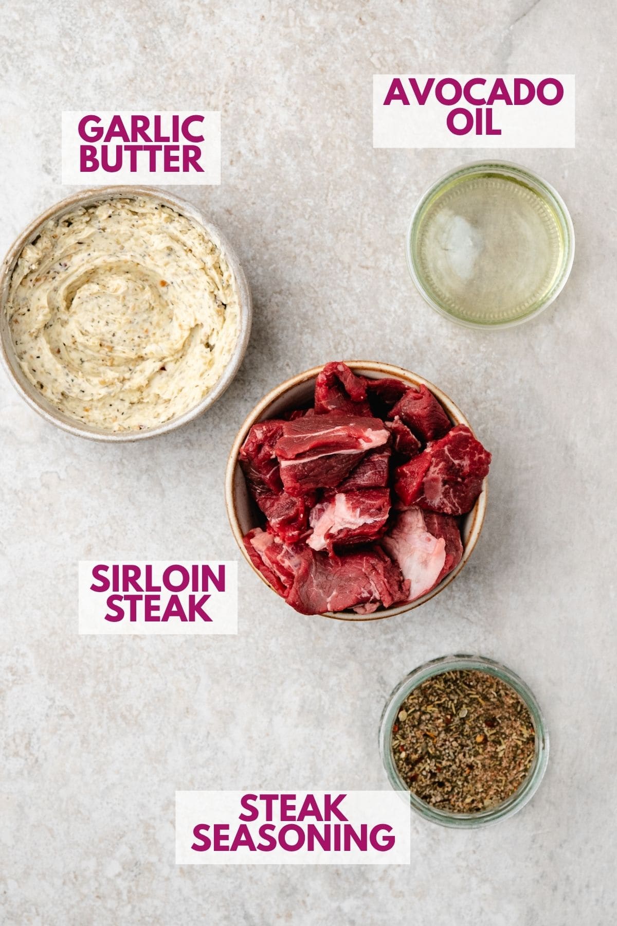 ingredients for steak bites with garlic butter recipe in small bowls