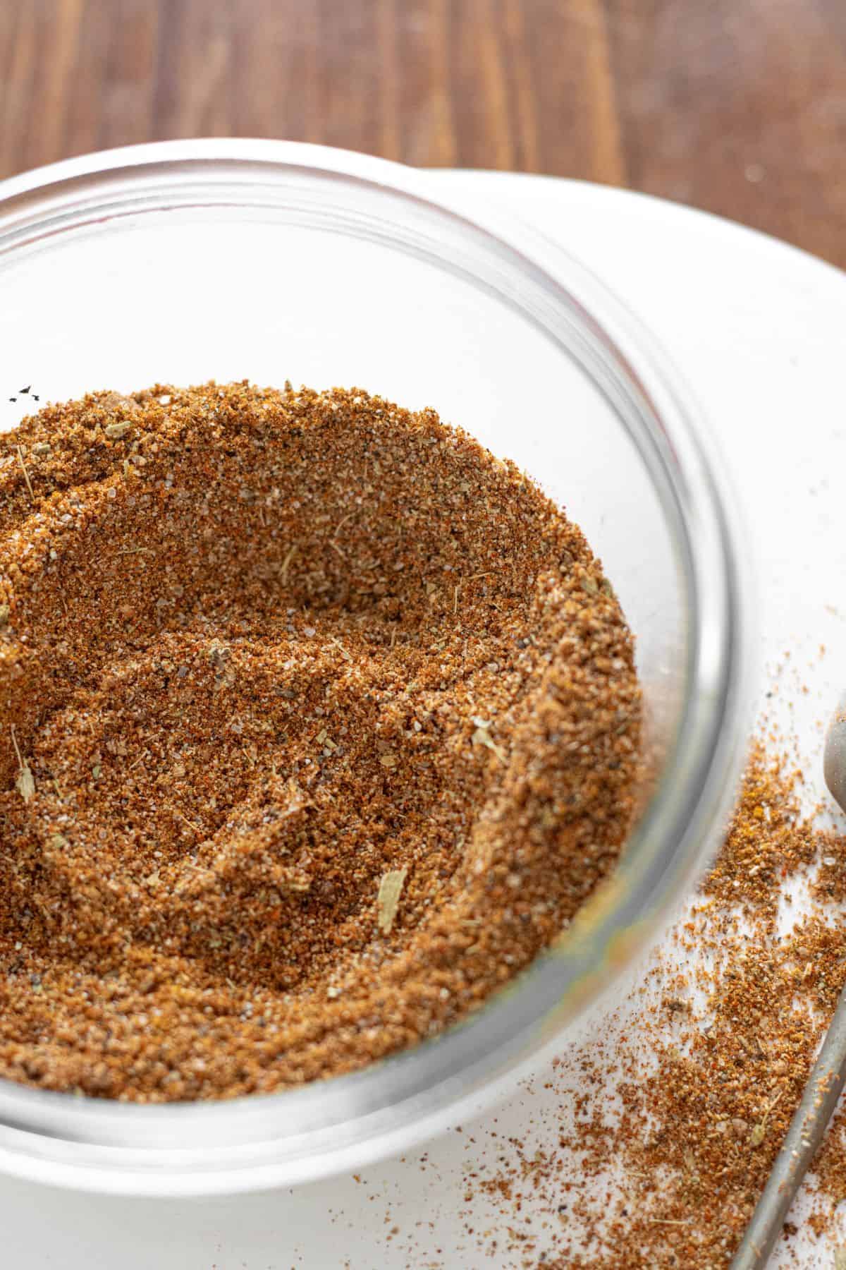 Small bowl filled with homemade shawarma seasoning blend