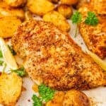 Easy sheet pan chicken dinner with tender potatoes and savory pan juices