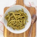 Tender canned green beans sautéed in butter and seasonings