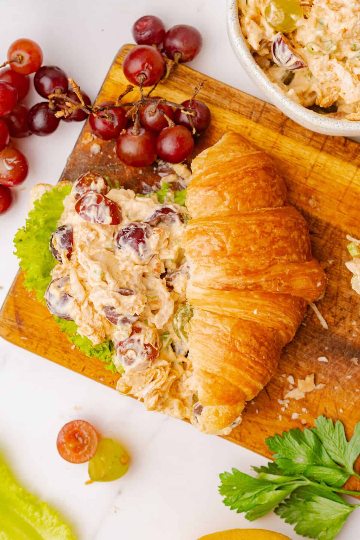 Rotisserie chicken salad with grapes served in a croissant