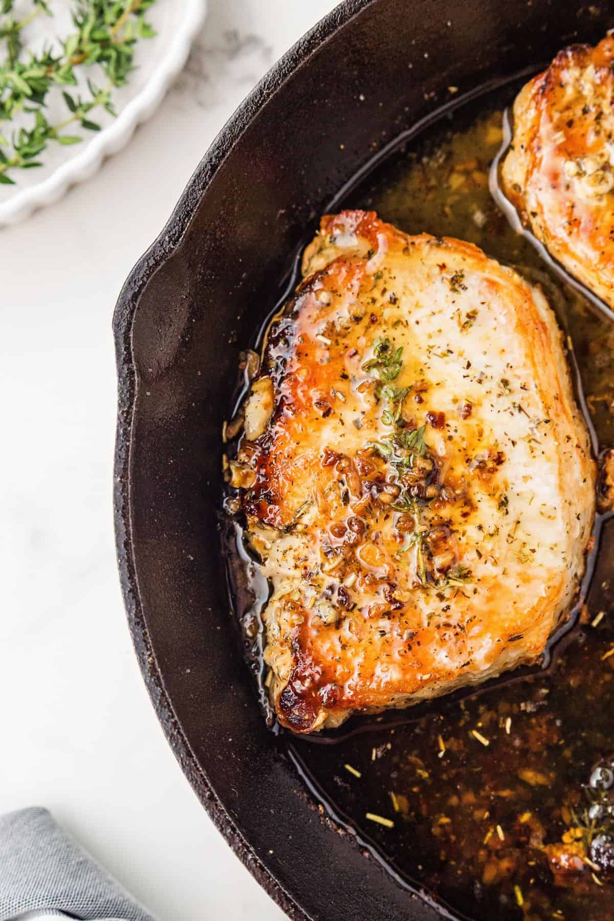 Easy skillet pork chops with garlic, thyme, and butter