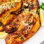 Pan seared tilapia with flaky texture and a bright lemon finish