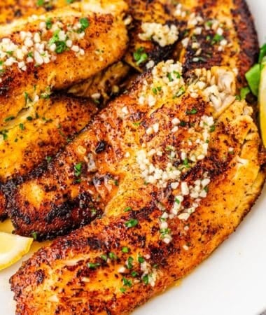 Pan seared tilapia with flaky texture and a bright lemon finish