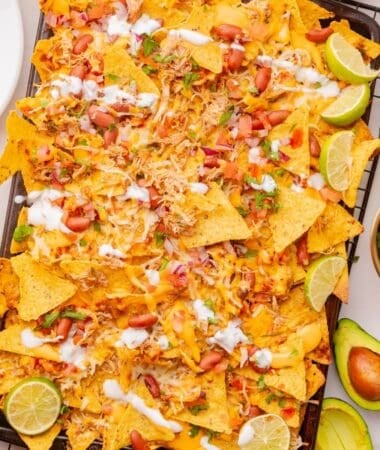 Loaded nacho platter with Mexican shredded chicken and cheese
