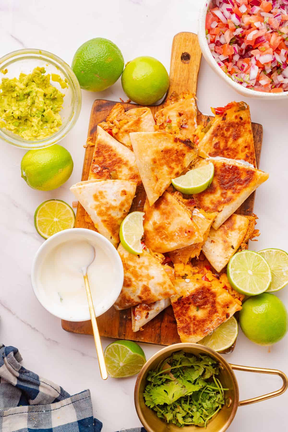 Flavorful chicken quesadilla cut into slices and ready to serve