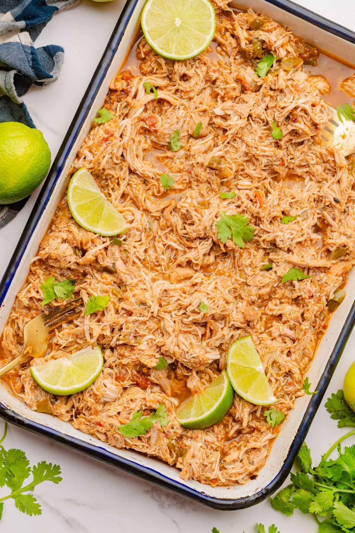 Slow cooker chicken shredded and seasoned for tacos and burrito bowls