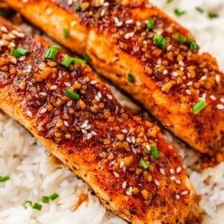 Salmon fillet glazed with teriyaki sauce alongside steamed rice