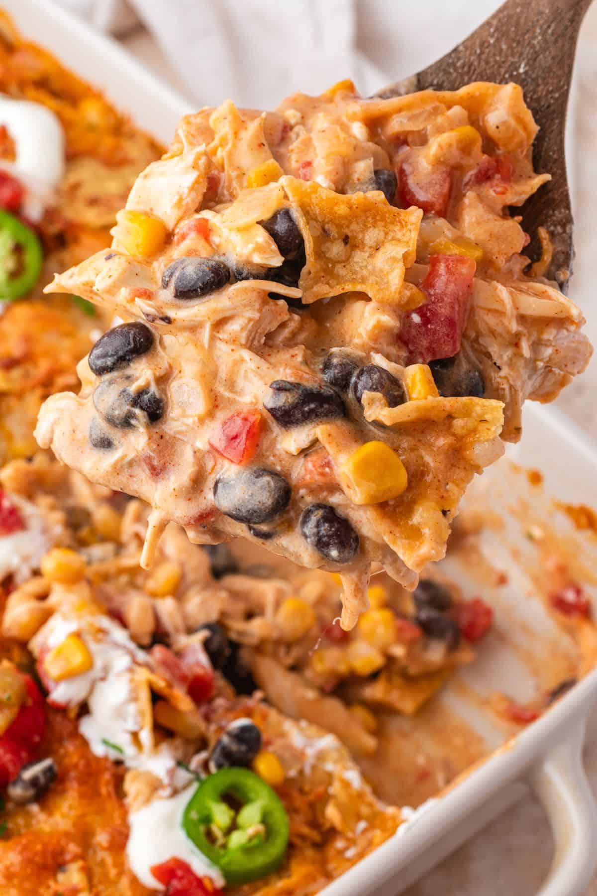 Chicken Mexican casserole baked until bubbly with crushed tortilla chips