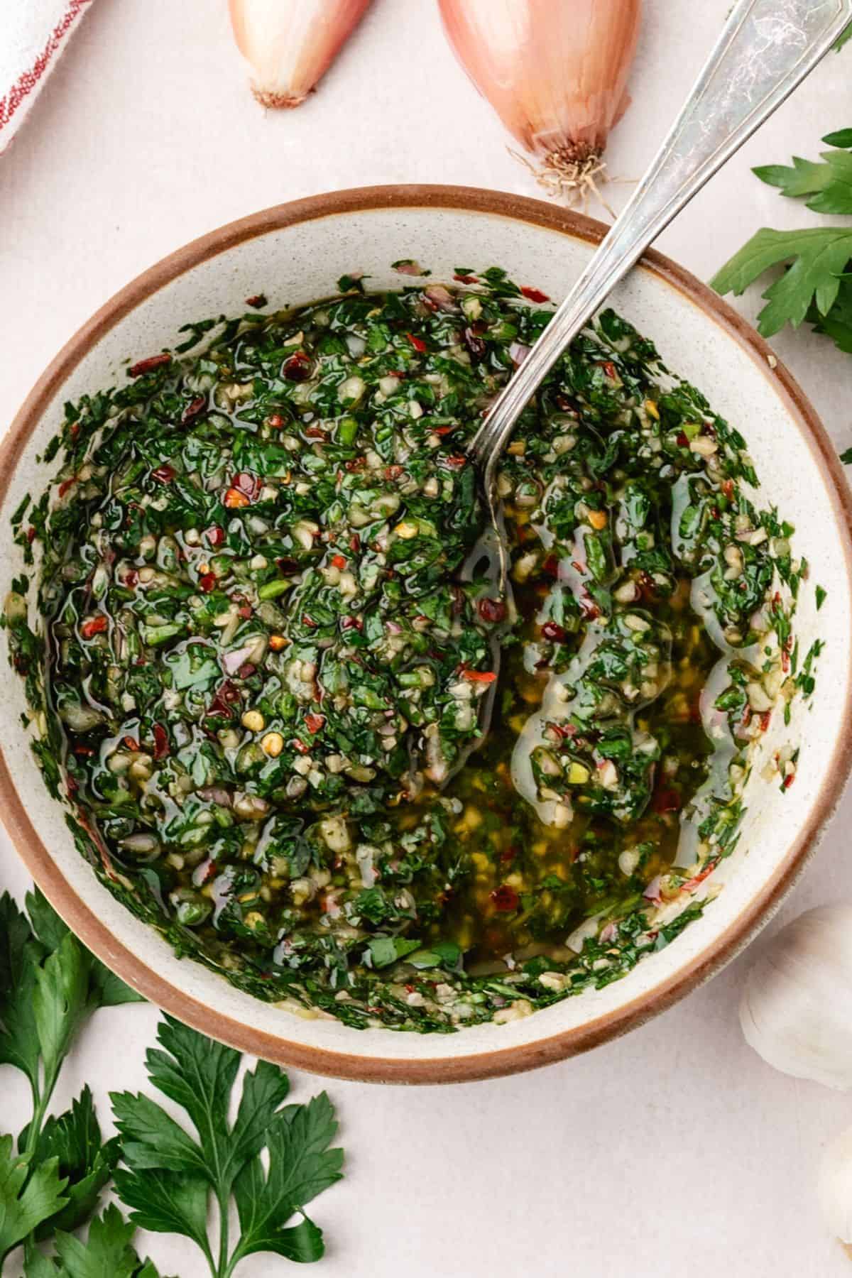 Vibrant green chimichurri recipe with herbs and garlic