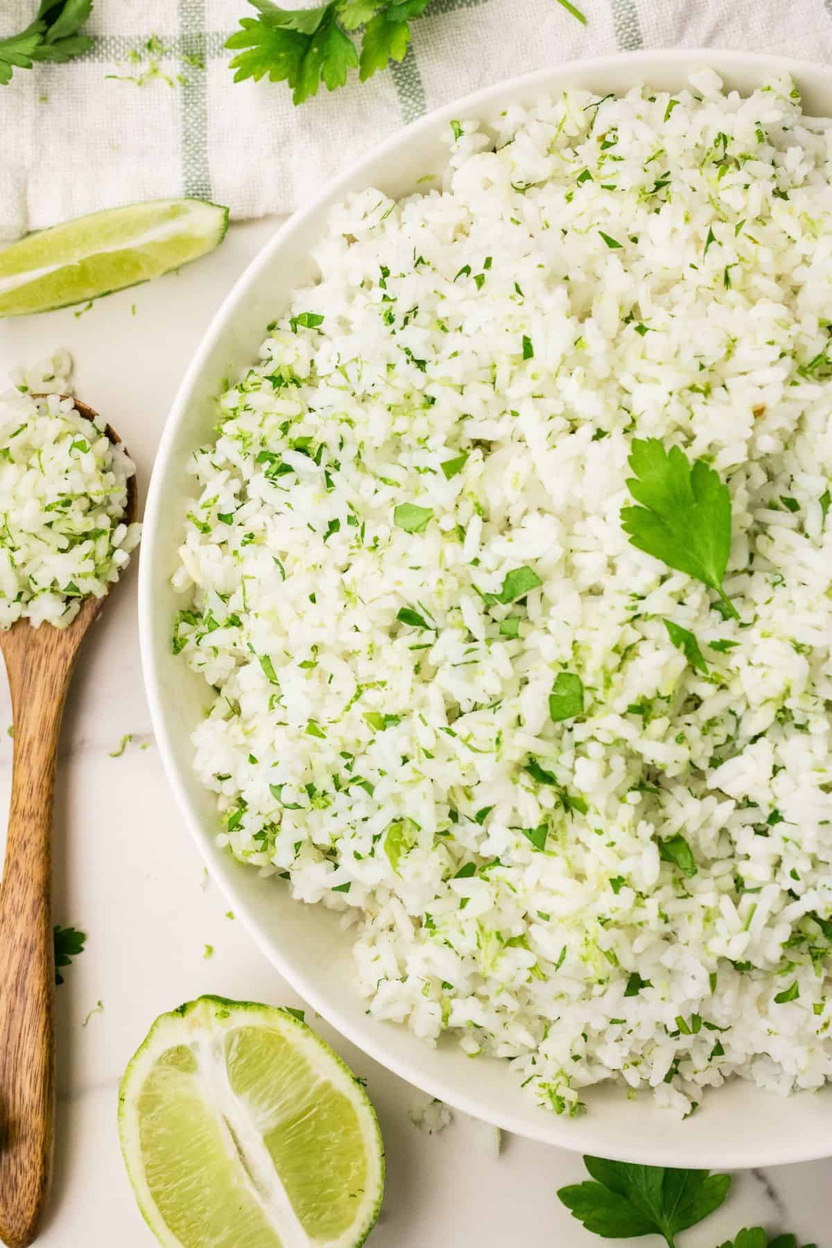 Cilantro and lime rice garnished with chopped cilantro leaves