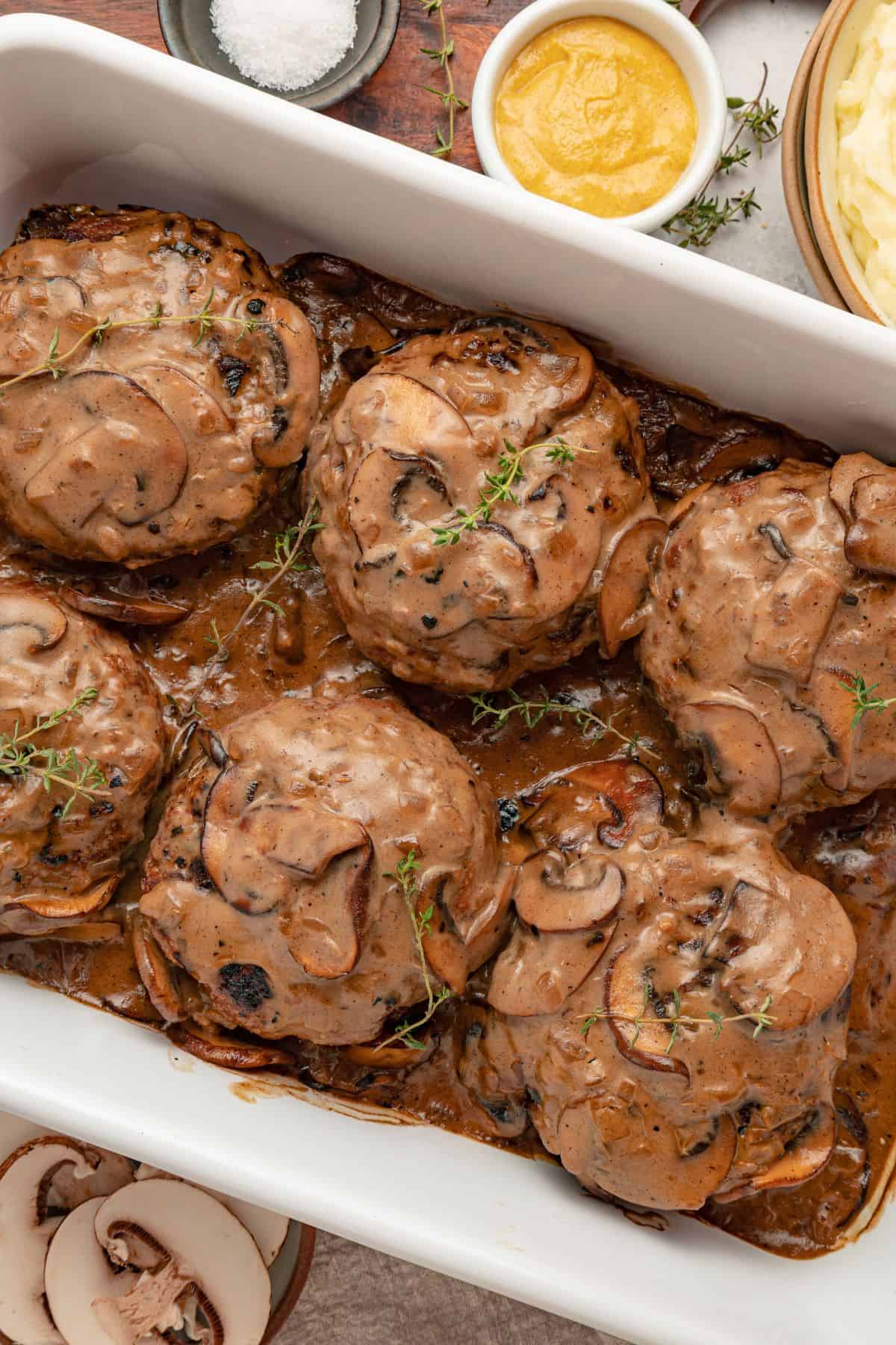 Oven hamburger steaks baked until tender in savory gravy