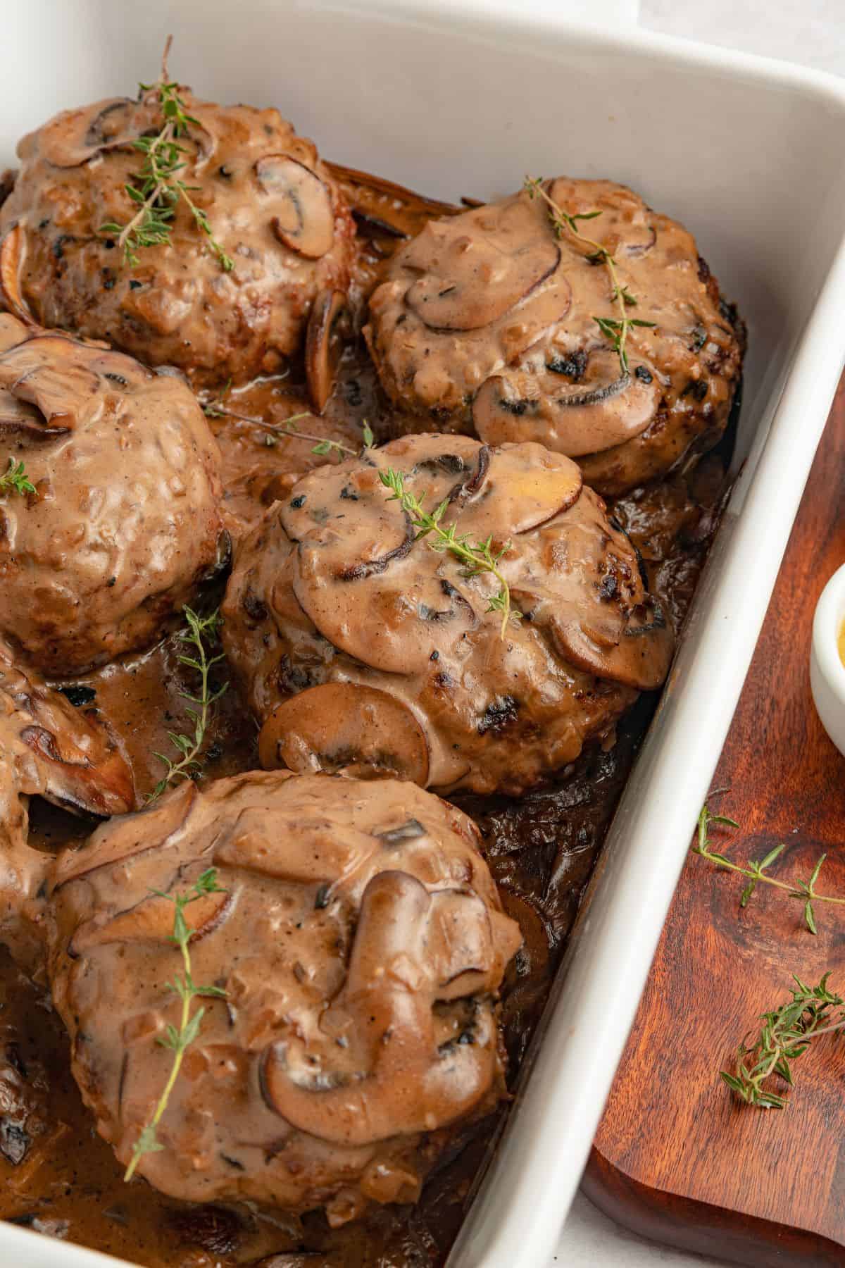 Juicy baked hamburger steak smothered in homemade onion gravy