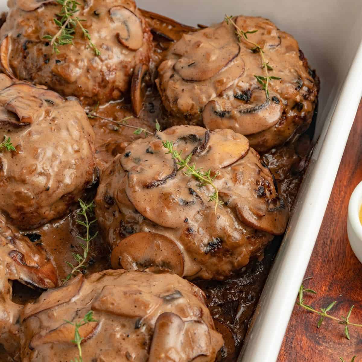 Tender oven hamburger steaks topped with mushroom onion sauce