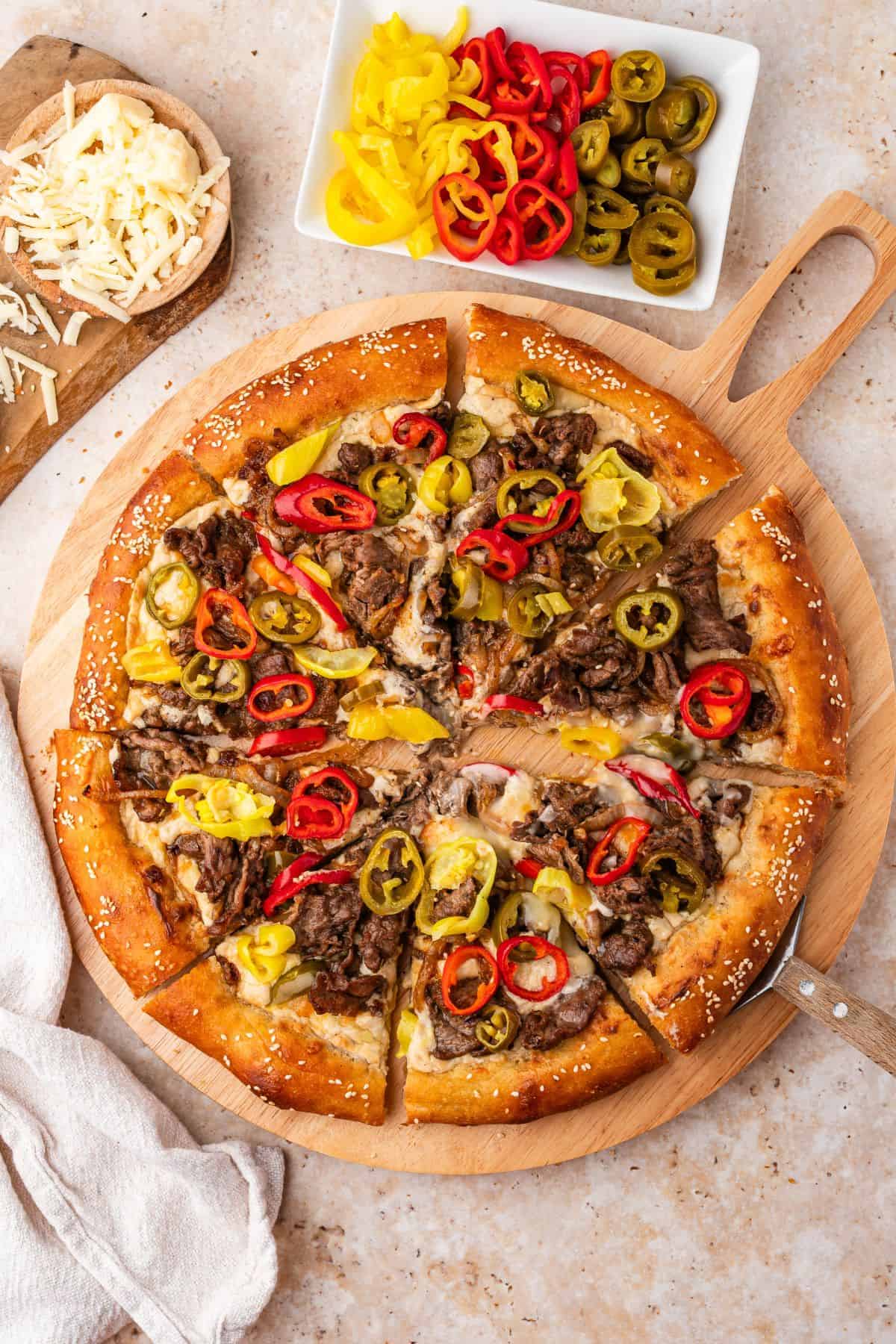 Crispy Philly cheese steak pizza with rich savory flavor