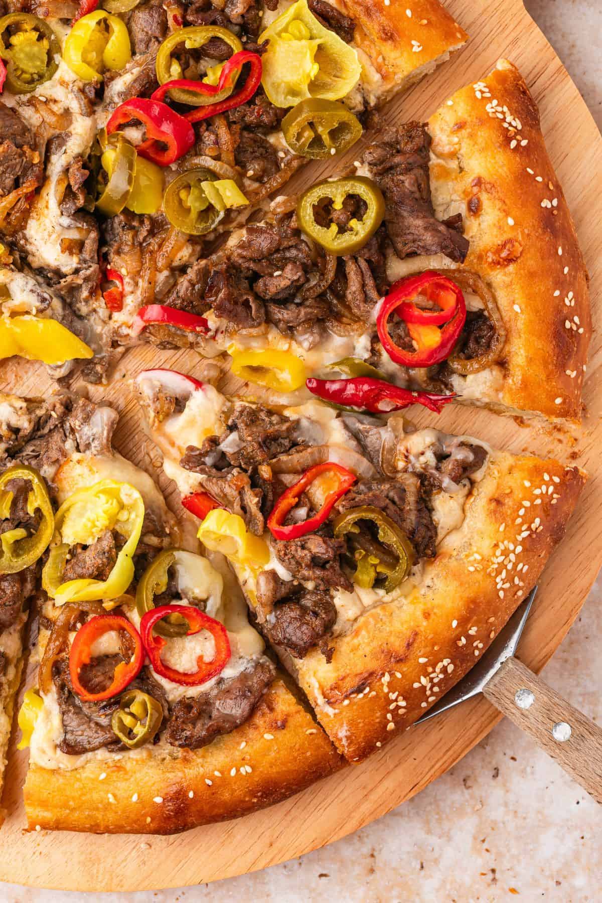 Homemade Philly cheesesteak pizza with creamy white sauce