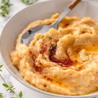 Browned butter garlic mashed potatoes with roasted garlic mixed in