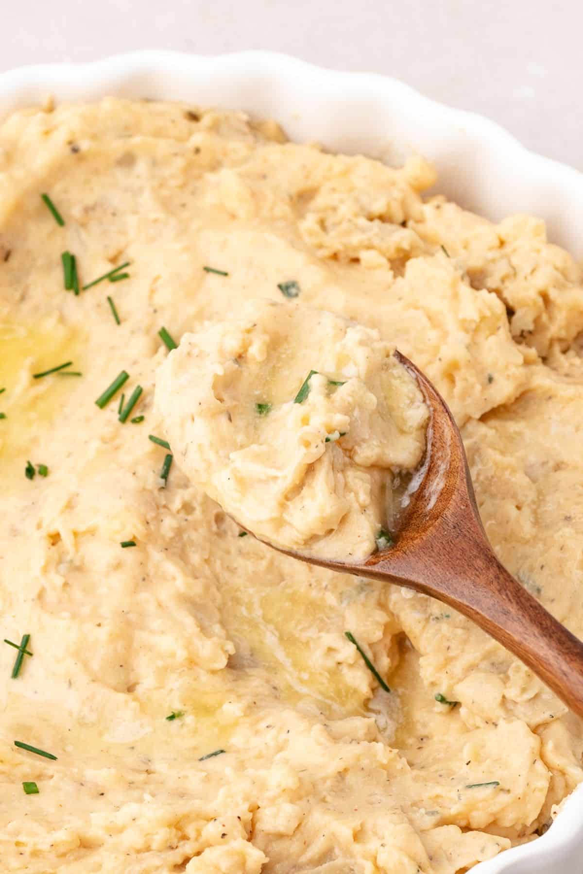 Mashed potatoes with cheddar cheese melted into creamy potatoes
