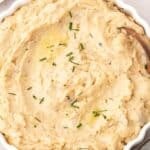 Simple cheesy mashed potatoes with gooey melted cheese throughout