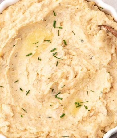 Simple cheesy mashed potatoes with gooey melted cheese throughout