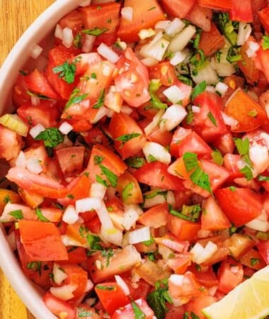 Easy pico de gallo recipe with tomatoes, onions, and jalapeños