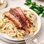 Homemade steak pasta with rich cream sauce and tender steak slices