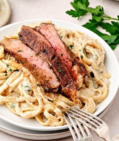 Homemade steak pasta with rich cream sauce and tender steak slices