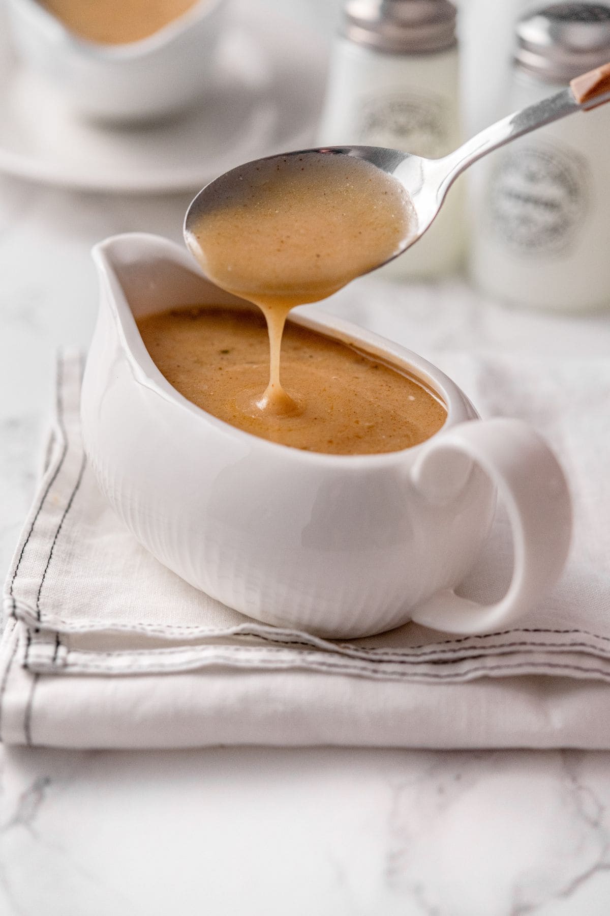 Creamy turkey gravy recipe served warm with classic holiday sides