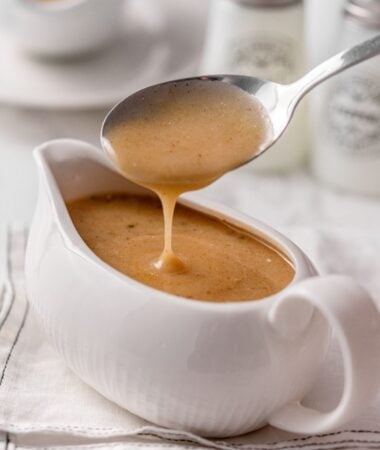 Smooth turkey gravy served warm in a gravy boat for dinner