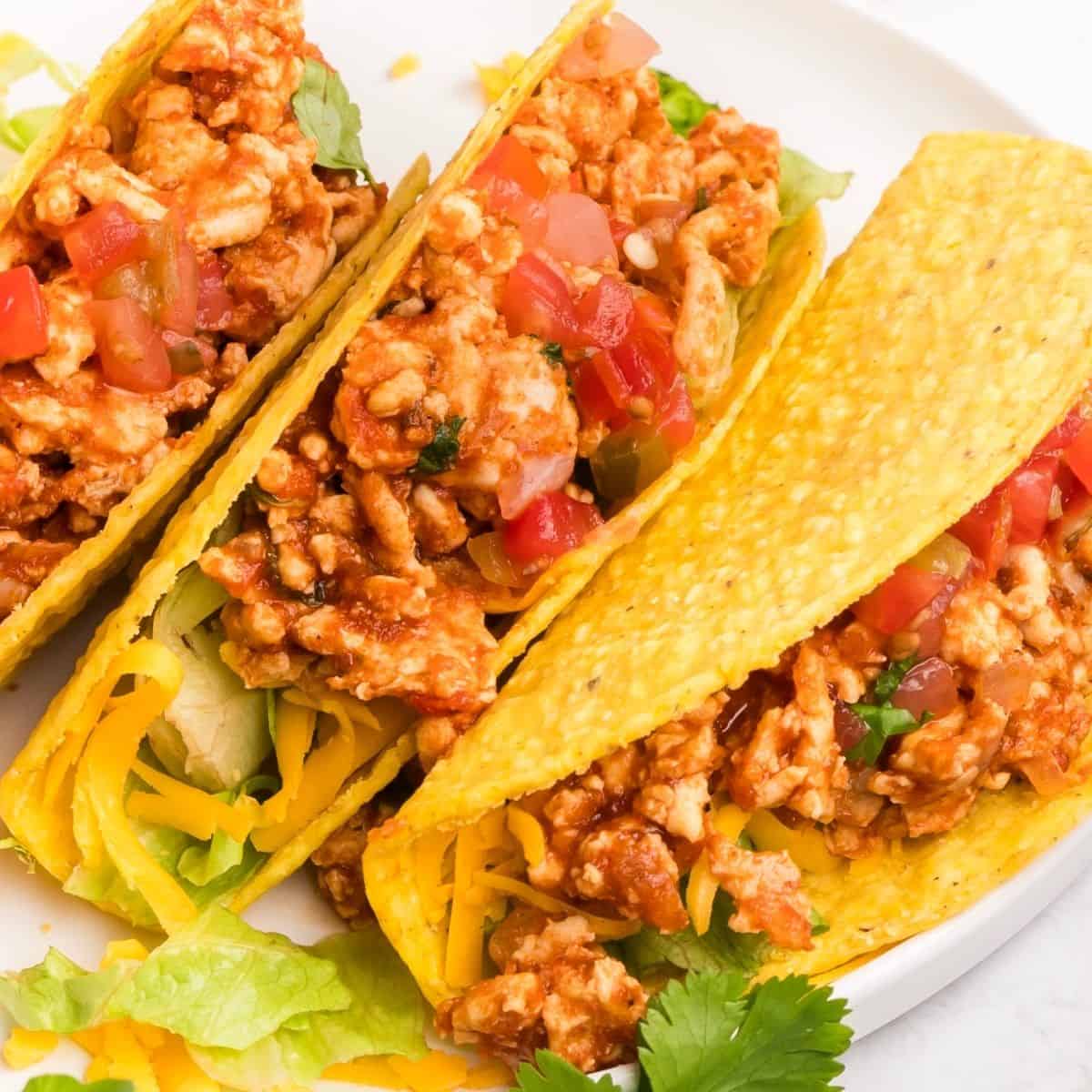 Chicken tacos ground chicken cooked with spices and tomato paste